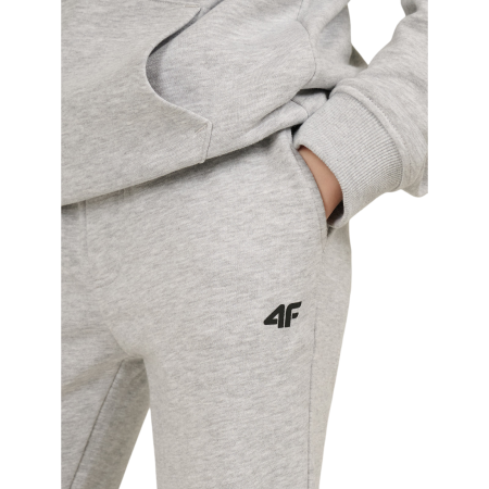 Dětské tepláky 4F Trousers Cas M1828 Cold Light Grey Melange